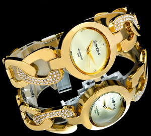 Błyszczący Damski Zegarek Gino Rossi Na Ciekawej Bransolecie Ozdobionej Kryształkami Swarovskiego Z Okrągłą Mieniącą Się Tarczą